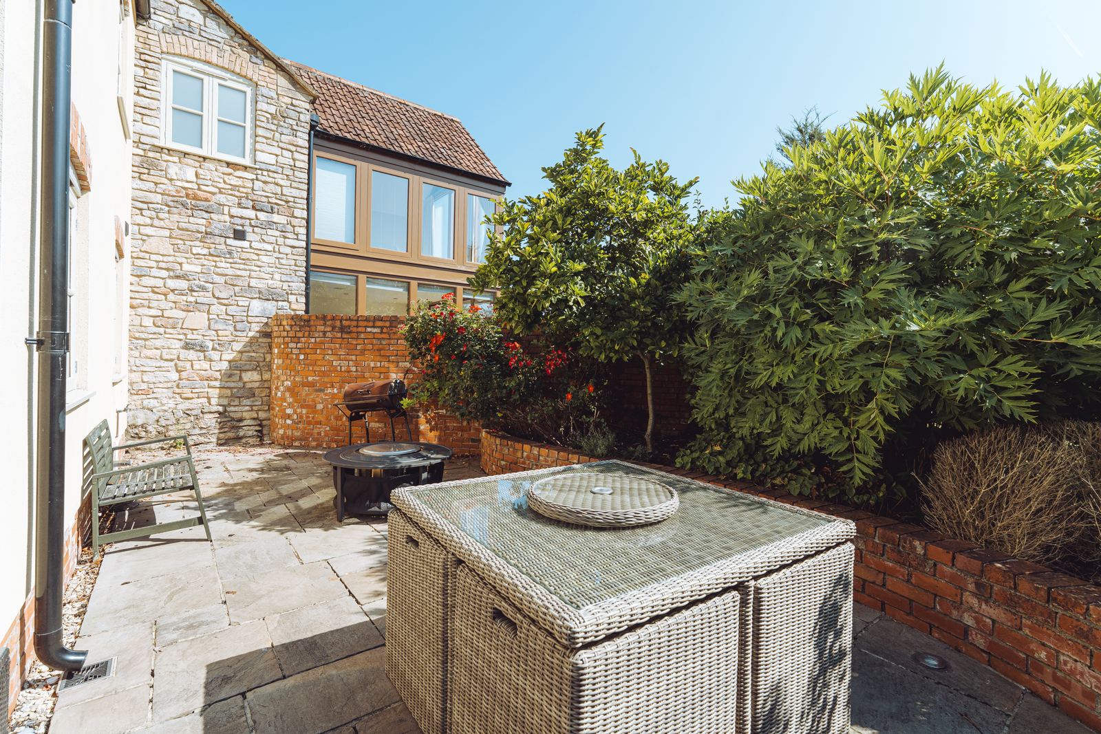 Patio with outdoor seating and barbecue