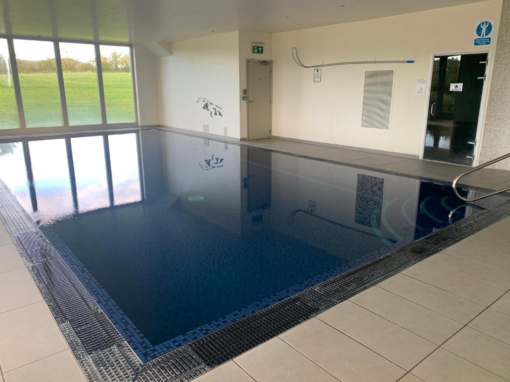 Indoor pool with views over the fields